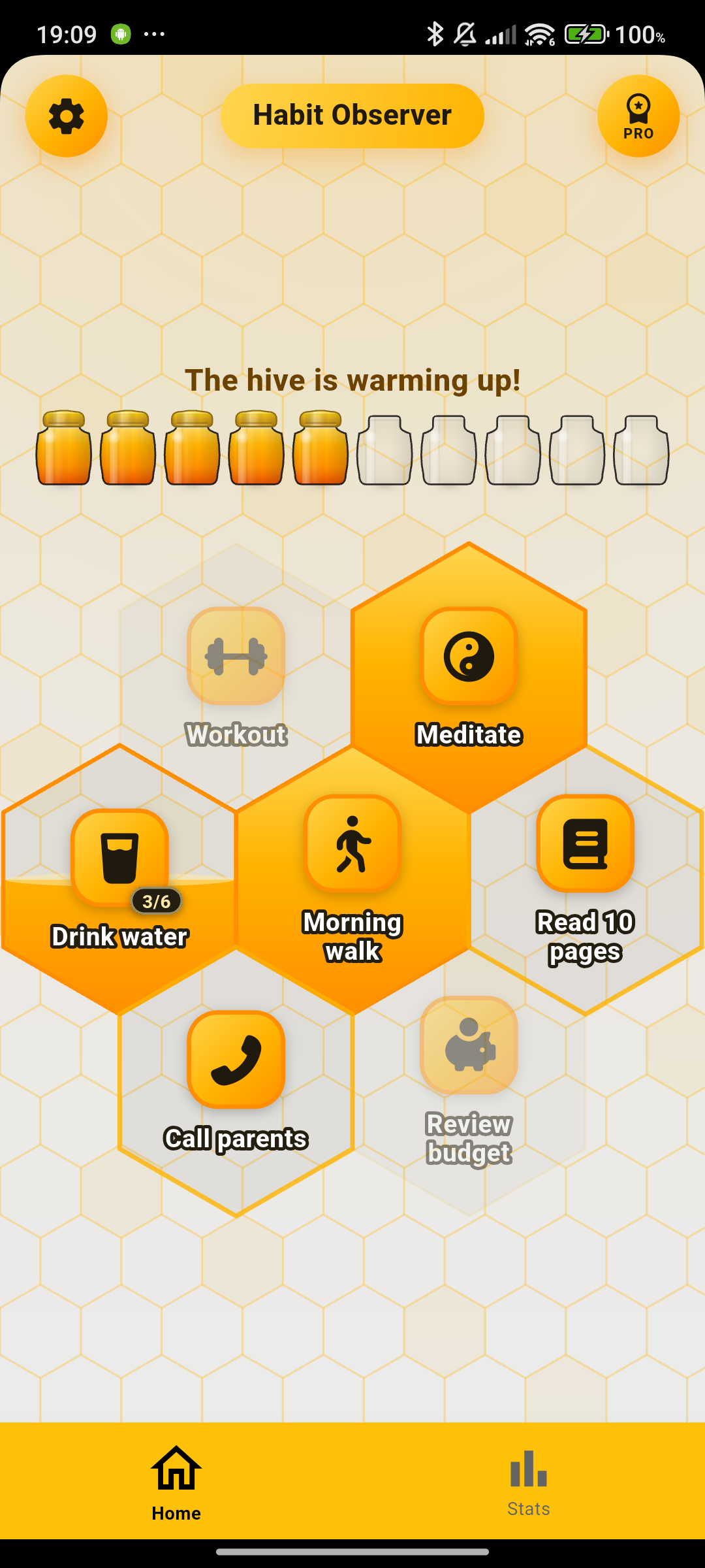 Habit Observer home screen: a honeycomb of habit cells with a row of honey jars showing the day's progress